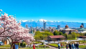 Capture Almaty cityscape featuring mountains and cherry blossoms at https://albmaftoh.com for travel inspiration.